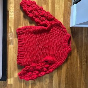 Haute Rouge red sweater with puffy boucle style sleevesvea